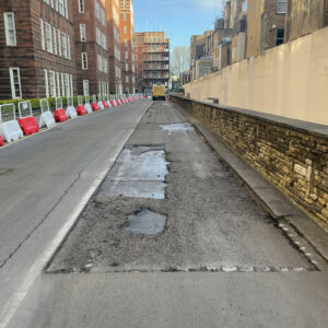 potholes patching road before