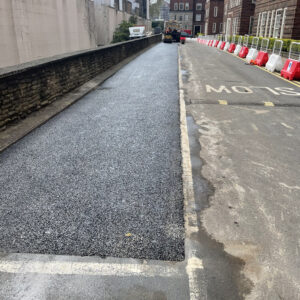 potholes patching road in progress