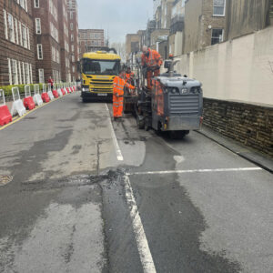 potholes patching road in progress