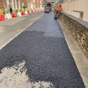 potholes patching road in progress