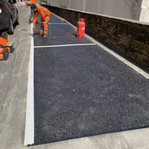 potholes patching road in progress